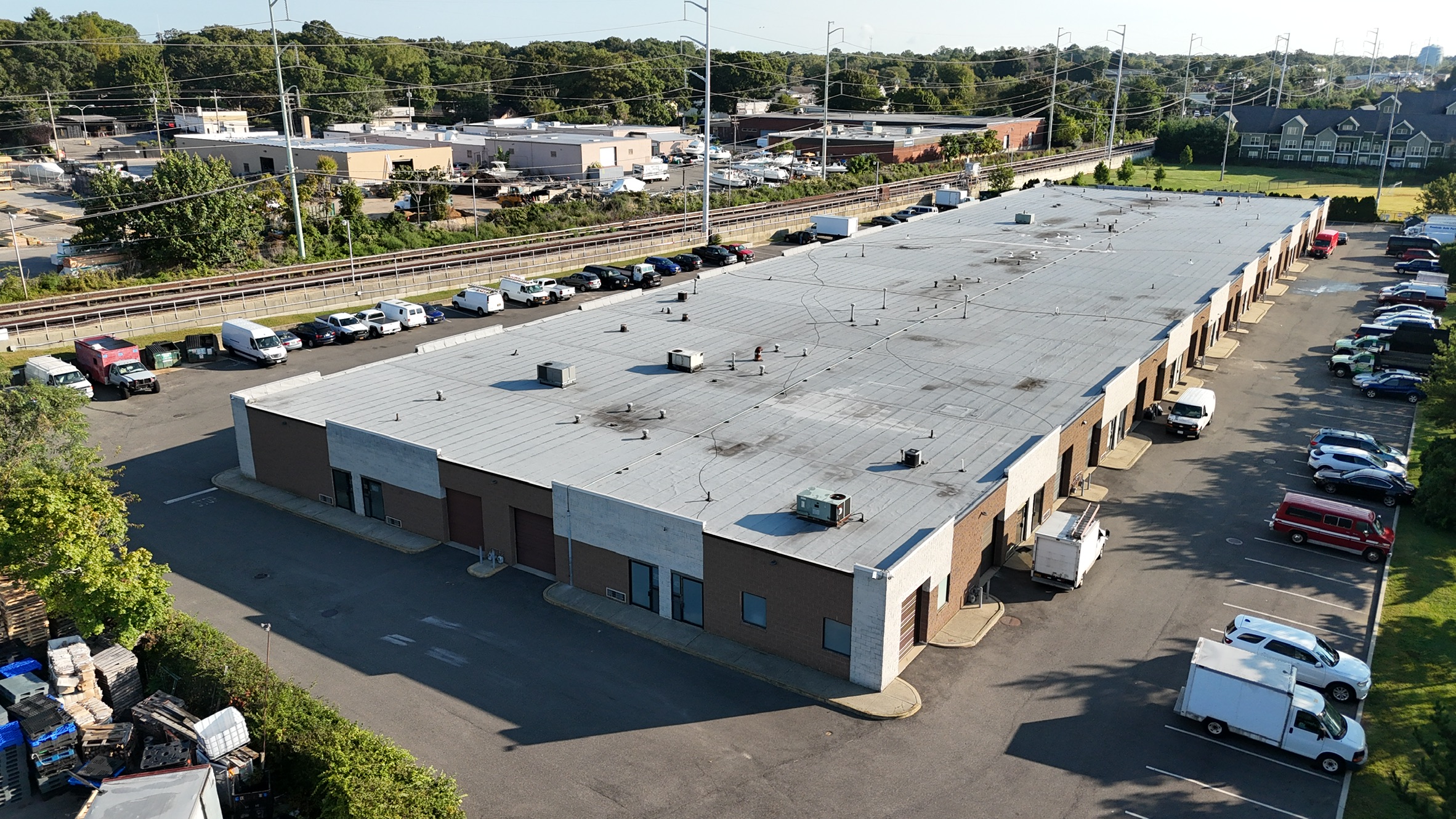 200 East 2nd Street Huntington Station NY — drone view of multi-tenant commercial flex building